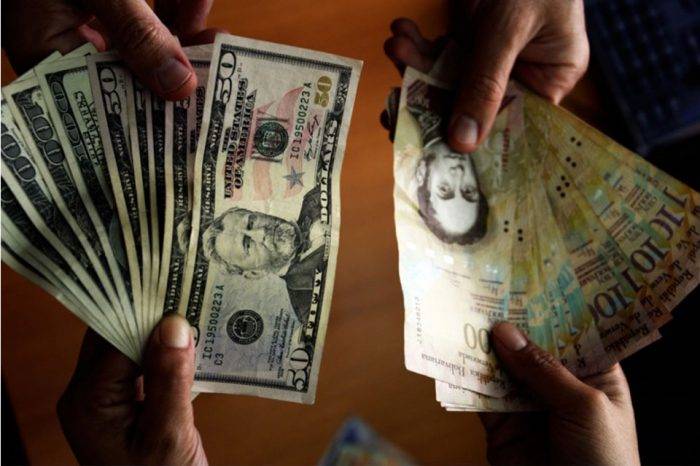 dolares y bolivares