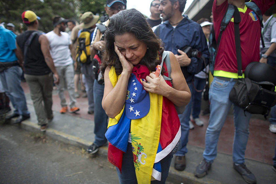 Venezolano-triste. Informe felicidad